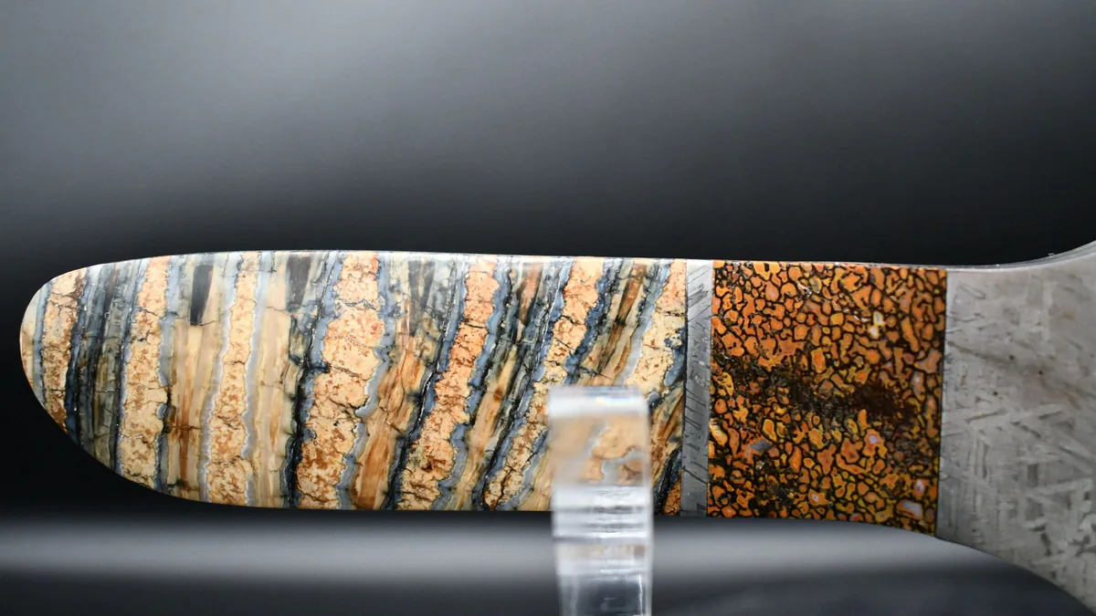 Dinosaur gembone and mammoth tooth handle detail